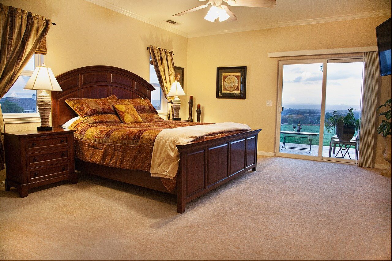 bedroom featuring spring decor 2022 bright lights and greenery 